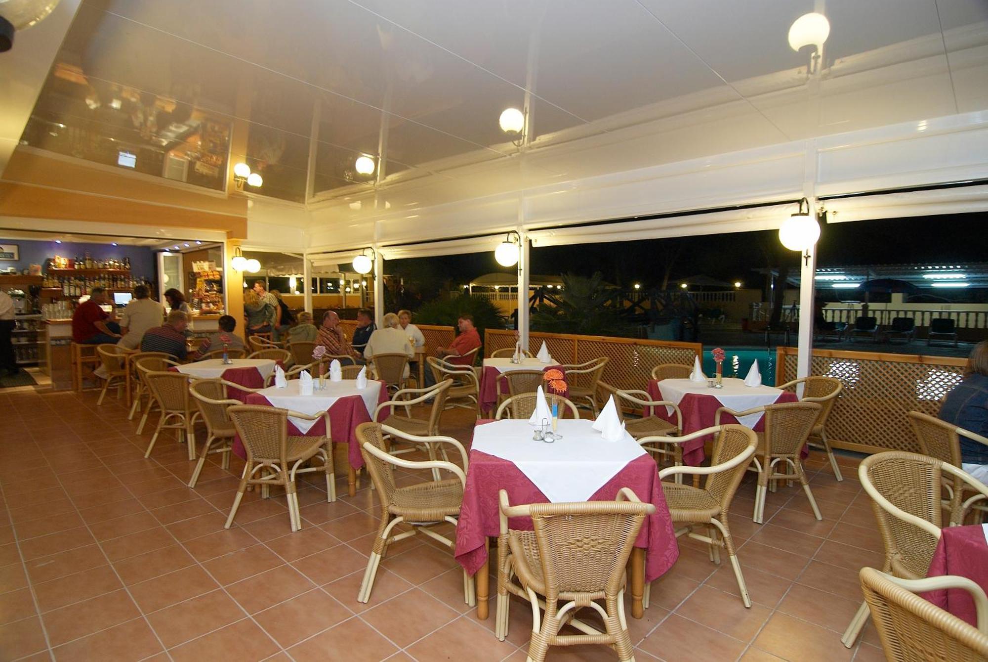 Ses Eufabietes Apartments & Restaurant Пляж Миджорн Экстерьер фото